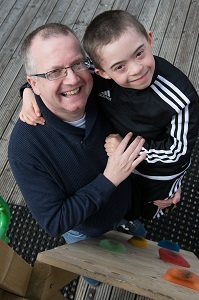 Picture of Adam, who was supported by the Foyle Down Syndrome Trust